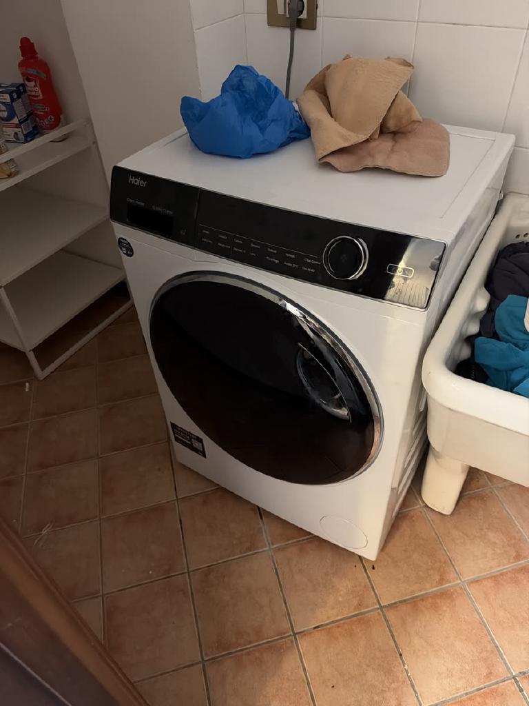 Peppina, in the flesh: a Haier with towels on its head